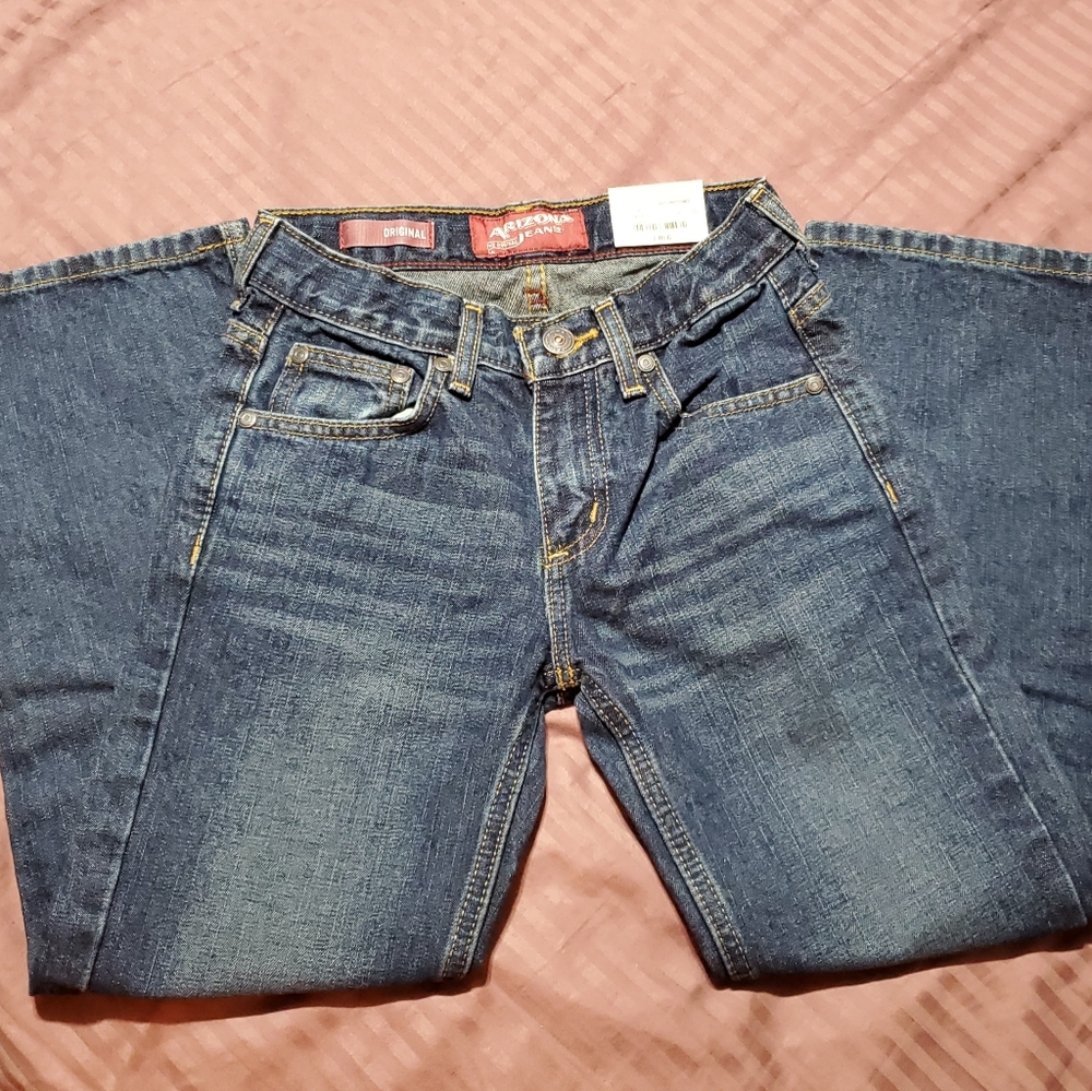 New Arizona dark blue kids jeans.  Size 7 Reg.